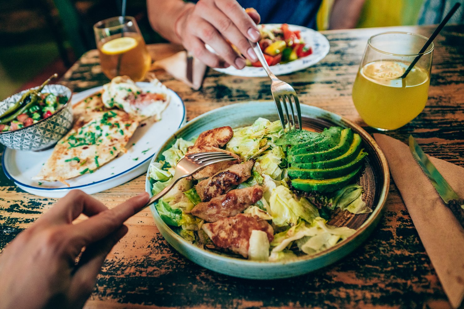 Couple eating healthy dinner at restaurant